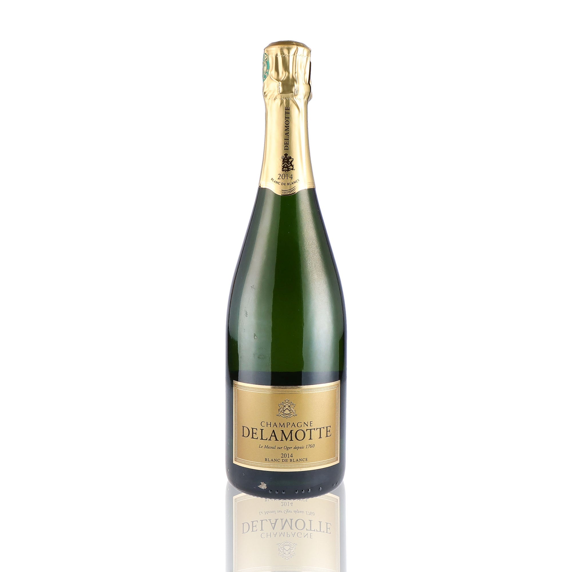 Une bouteille de champagne de la marque Delamotte, de type blanc de blancs, millésime 2014.