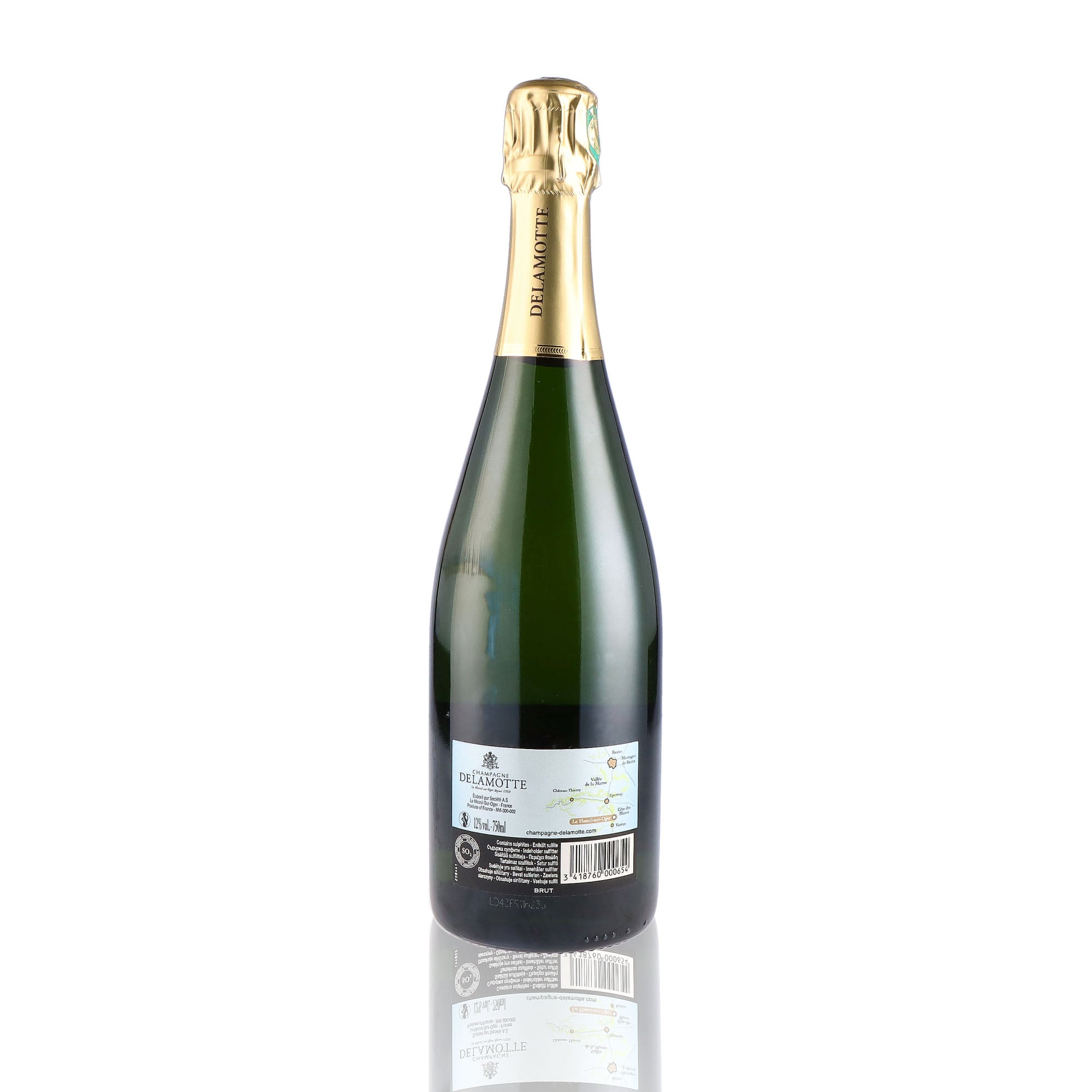 Une bouteille de champagne de la marque Delamotte, de type brut.