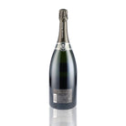 Une bouteille de champagne de la marque Laurent Perrier, de type brut, millésime 1999.