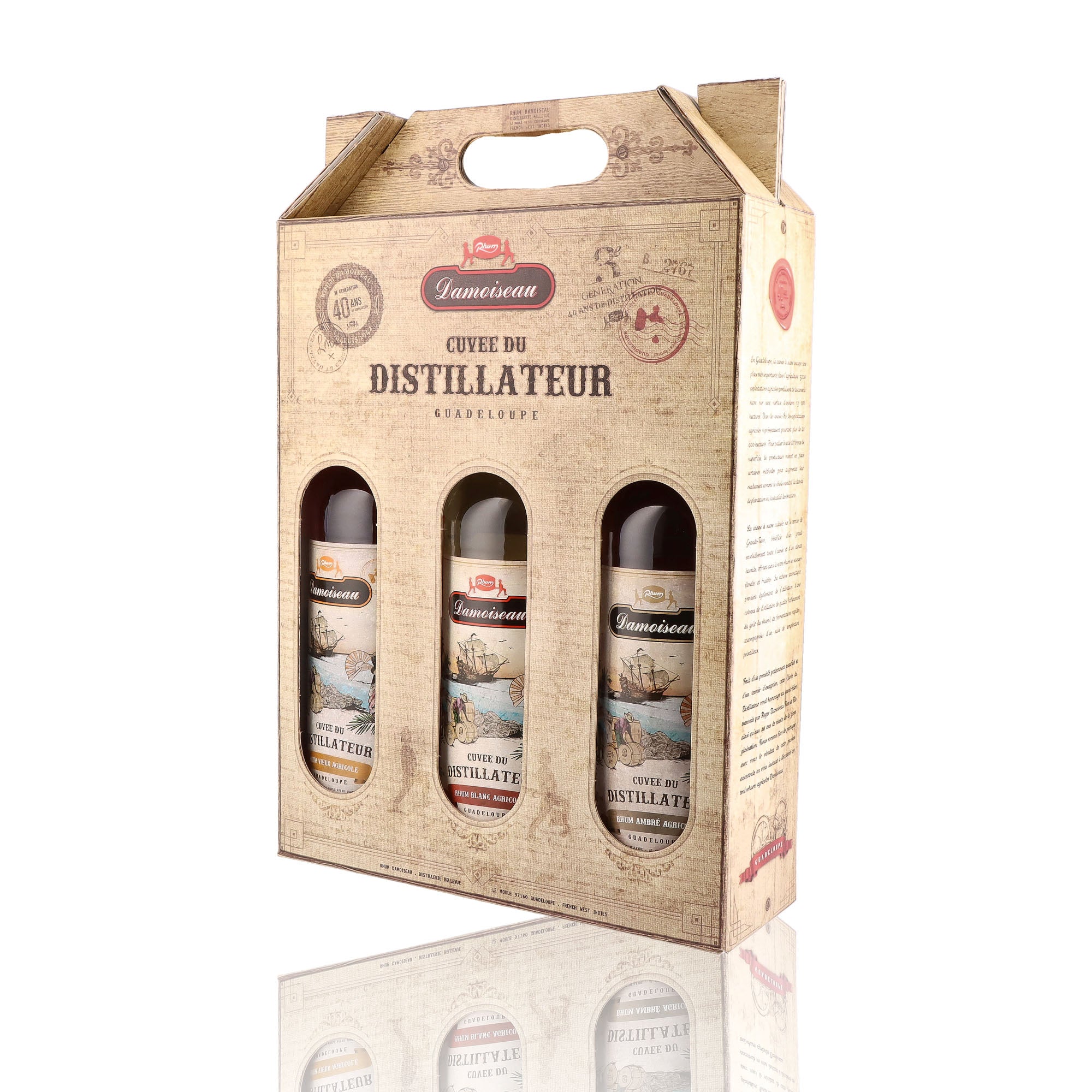 Un coffret de rhum agricole, de la marque Damoiseau, nommée Cuvée du Distillateur, 3 bouteilles.