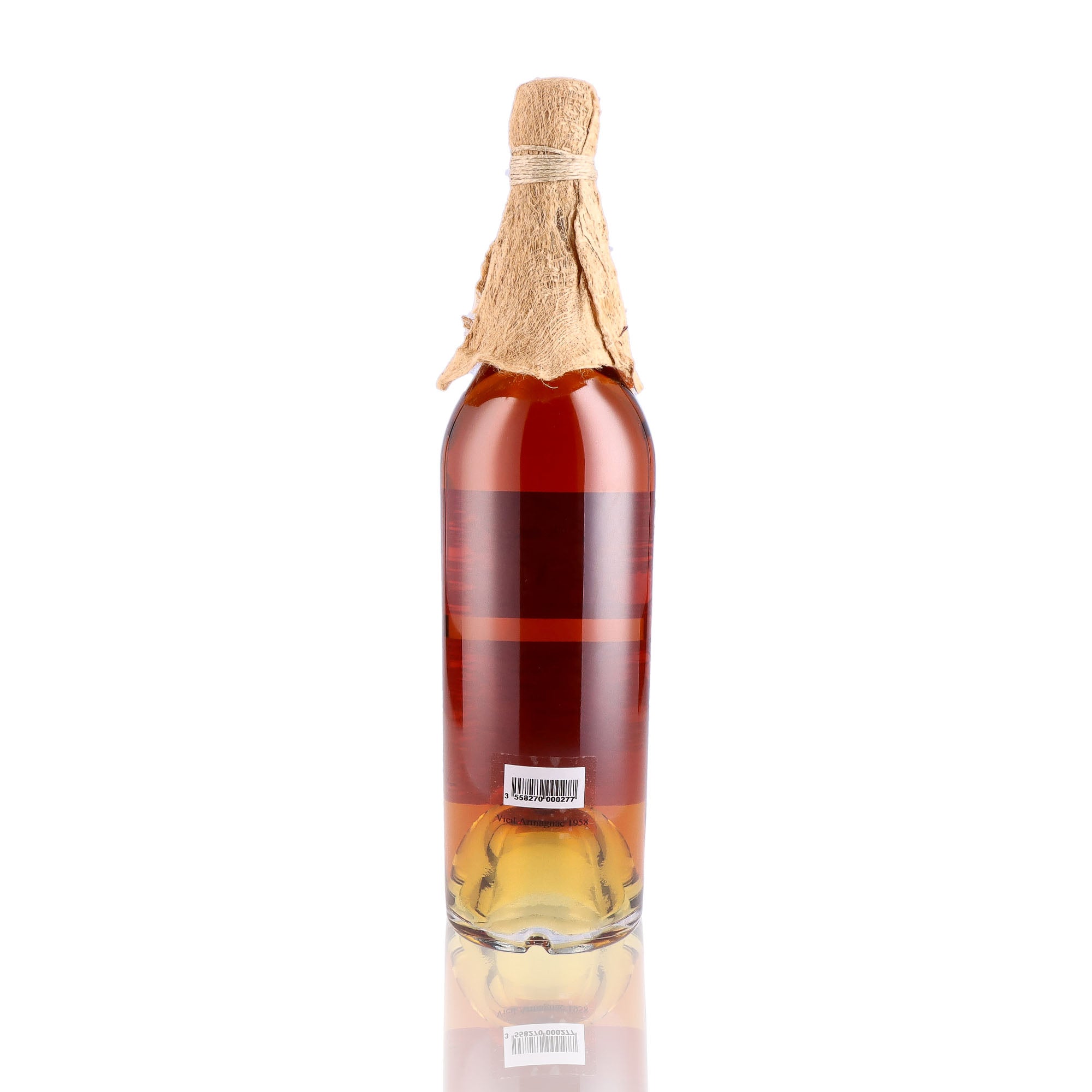 Une bouteille de Vieil Armagnac, de la marque Baron Gaston Legrand, du millésime 1958.