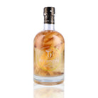 Une bouteille de Rhum Arrangé, de la marque Les Rhums de Ced', nommée TI Arrangés Pomme Gingembre.
