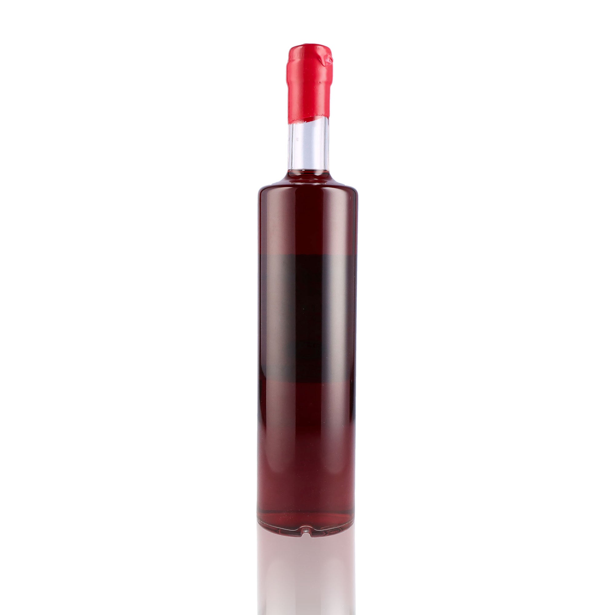 Une bouteille de Liqueur, de la marque Louis Roque, nommée Crème de Fraise des Bois.